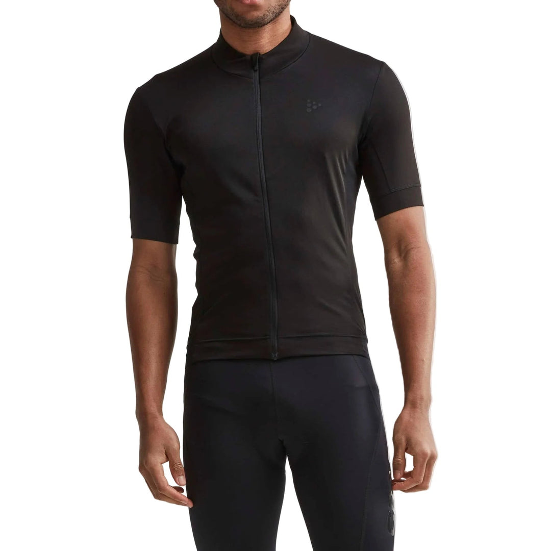 Male cyclist riding in Craft Essence Jersey Men&