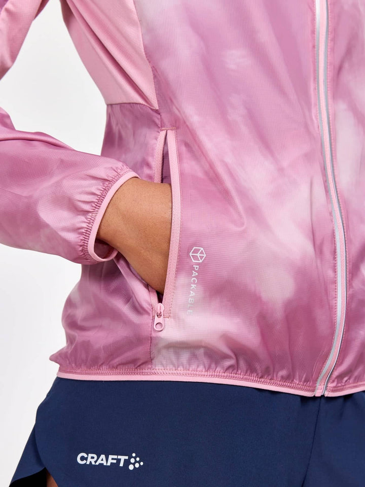 Pink jacket with a visible Craft logo on a white background