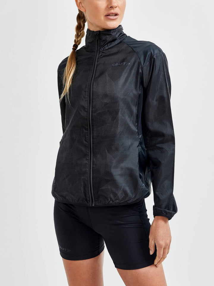 Craft Pro Hypervent Jacket Women’s in Black with maximum breathability, moisture-wicking fabric, and reflective details. ON MODEL