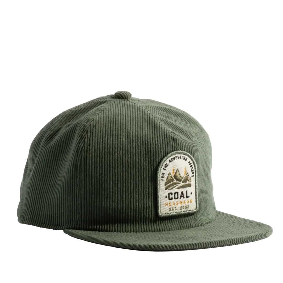 Green corduroy cap with a patch on a white background