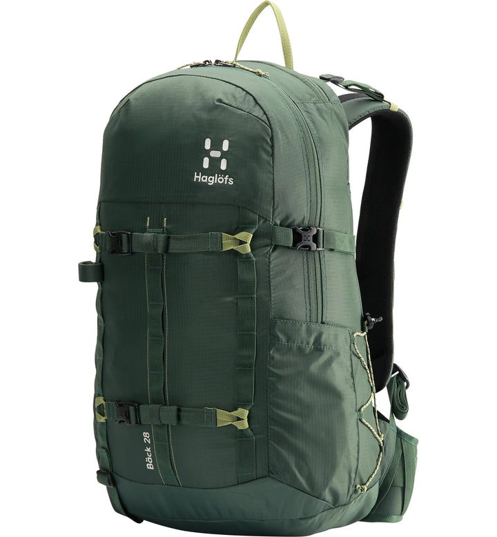 Green backpack with visible brand logo on a white background