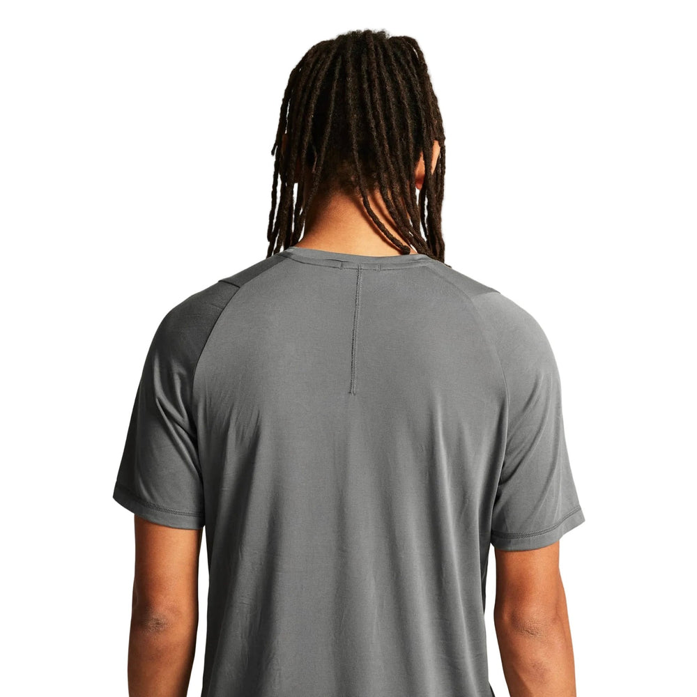 Back view of Craft Core Essence Bi-Blend Tee Men's showcasing lightweight breathable construction and comfortable regular fit.