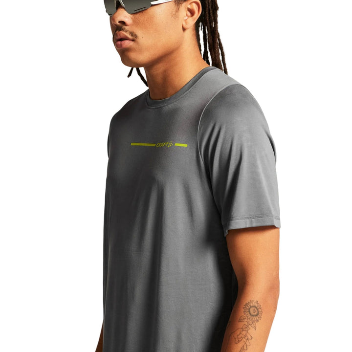 Side profile of male model wearing Craft Core Essence Bi-Blend Tee Men&
