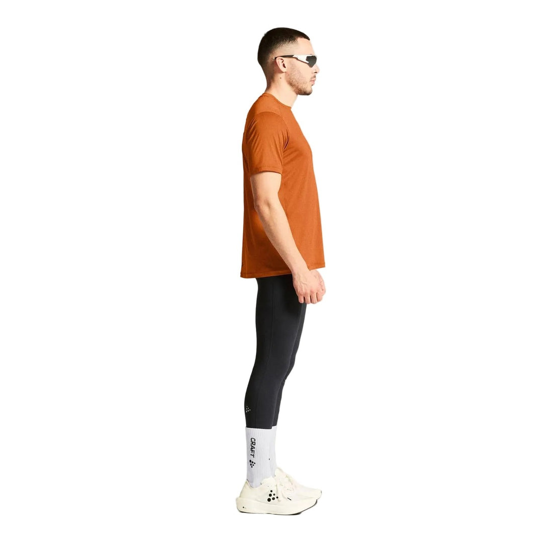 Side profile of male athlete wearing Craft ADV Essence SS Tee 2 Men&