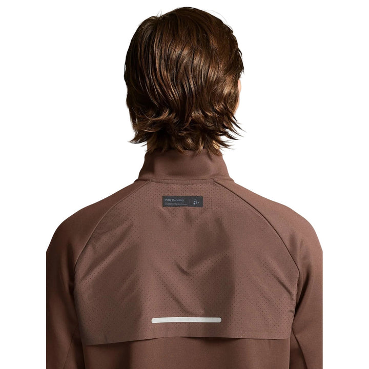 Close-up view of reflective detailing on the Craft SubZ Jacket 4 Men&