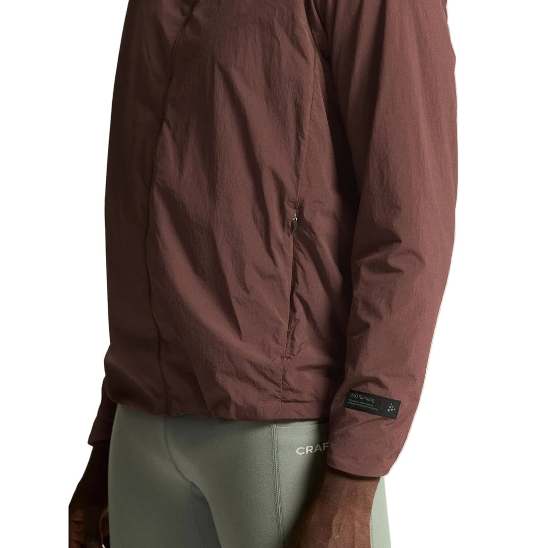Close-up view of reflective detailing on the Craft SubZ Light Jacket Men&
