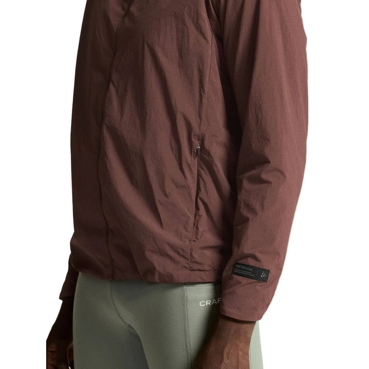 Close-up view of reflective detailing on the Craft SubZ Light Jacket Men&