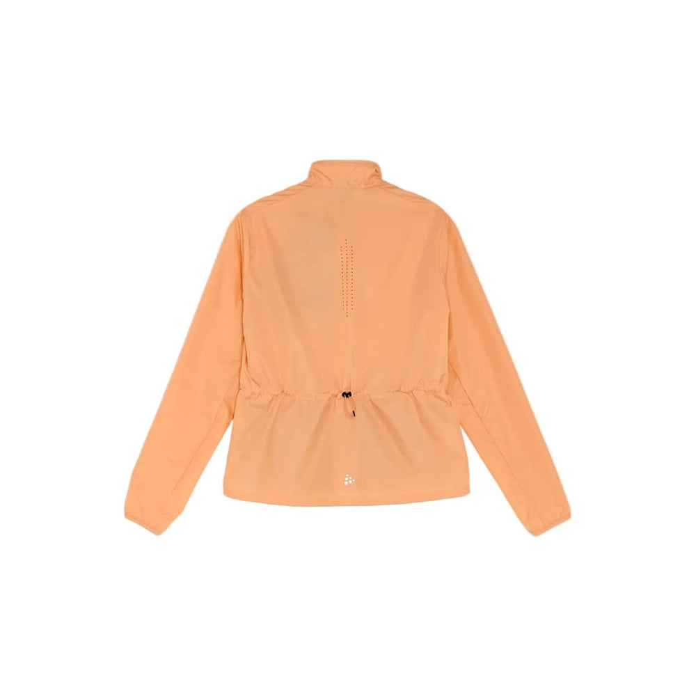 Back view of Craft ADV Essence Wind Jacket Women's showcasing breathable construction and lightweight outdoor performance styling.