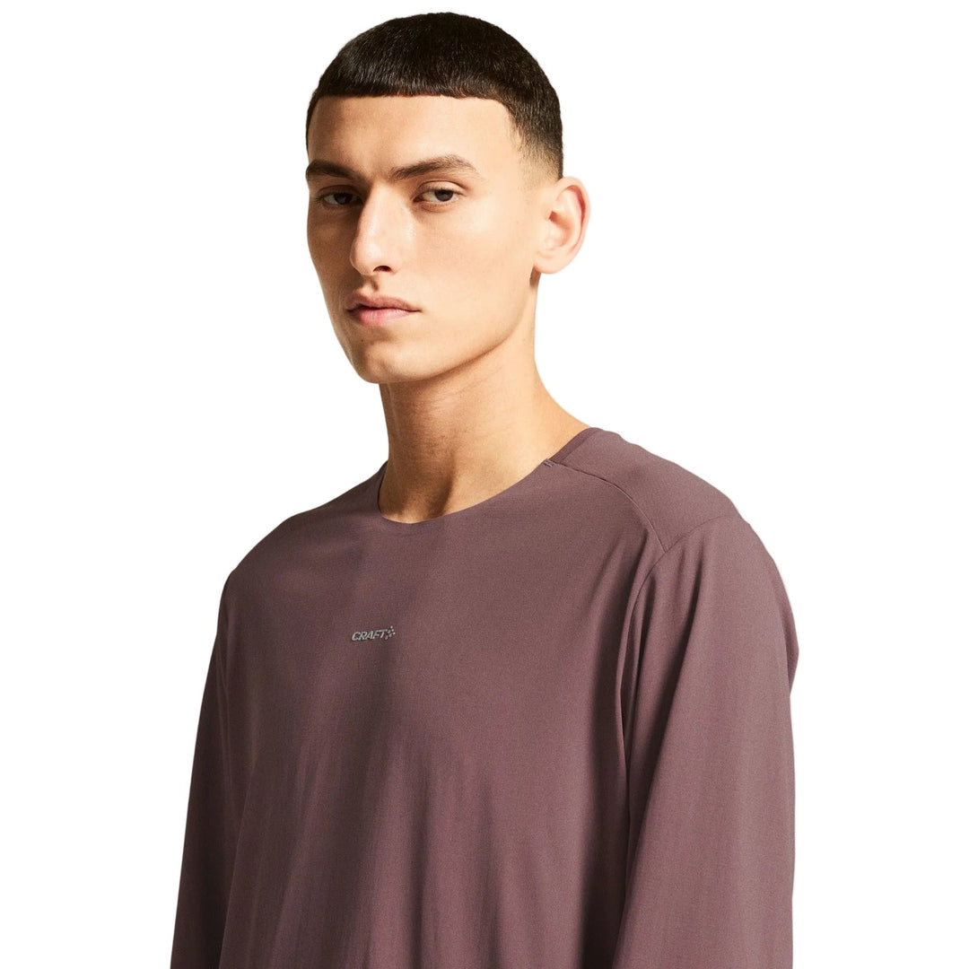 Side profile of male athlete wearing Craft Hypervent Longsleeve Men&