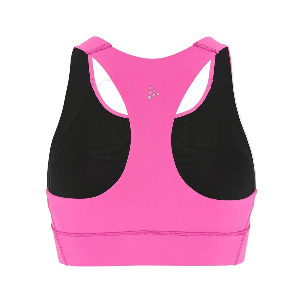 Back view of Craft Hypervent Pocket Sport Top Women's showcasing ventilated performance fabric and secure athletic support.