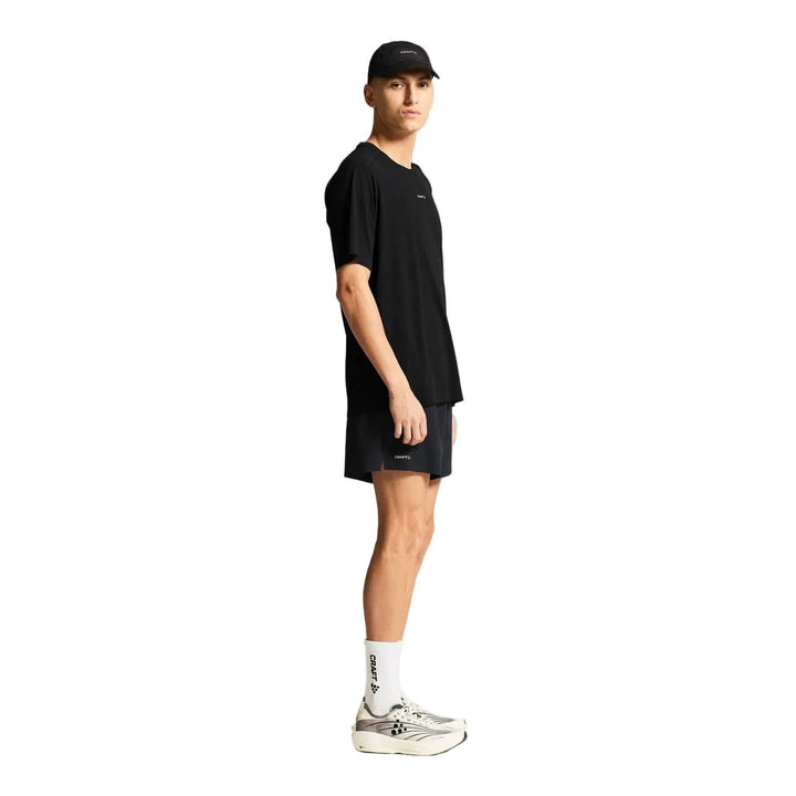 Side profile of male athlete wearing Craft Hypervent Tee Men&