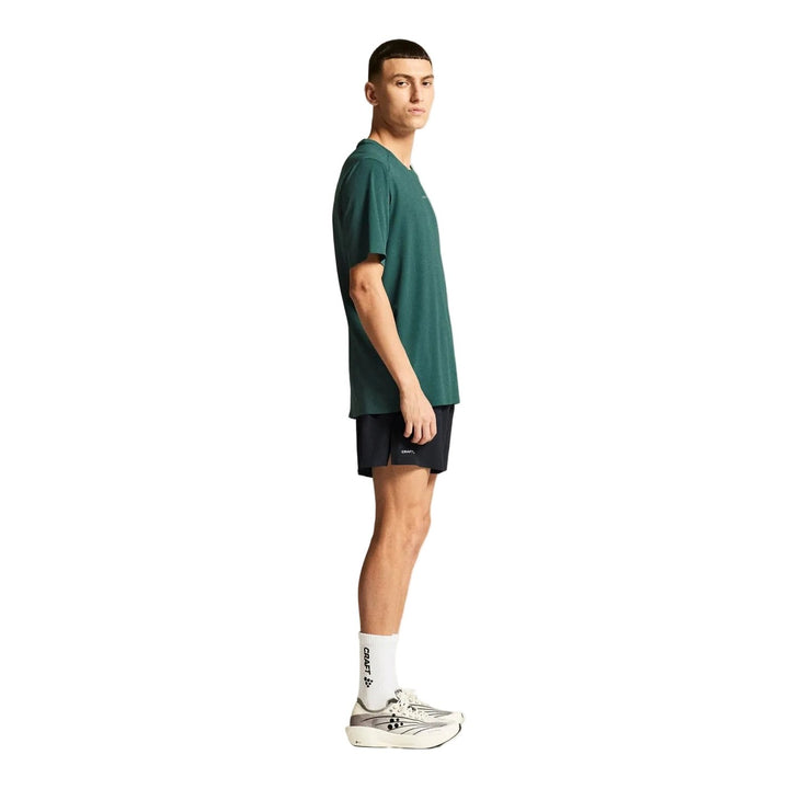 Side profile of male athlete wearing Craft Hypervent Tee Men&