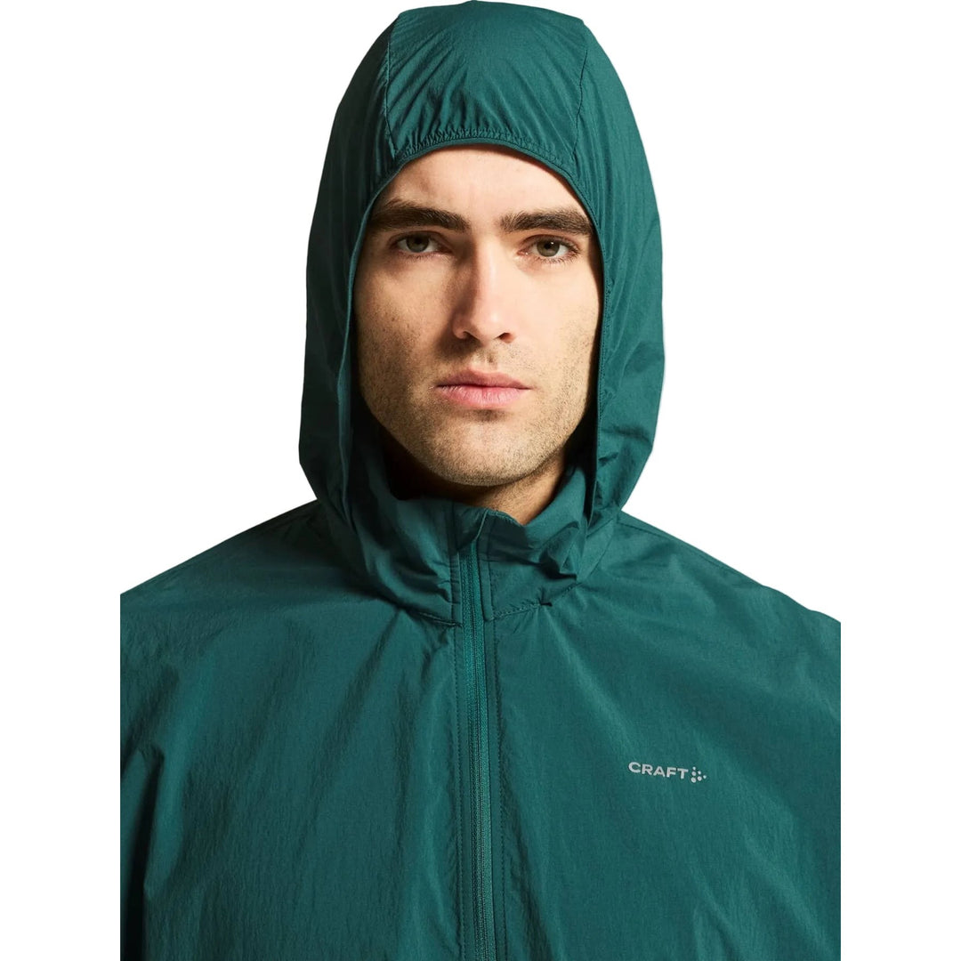 Close-up view of the full-front zipper on the Craft Hypervent Oversized Wind Jacket Men&