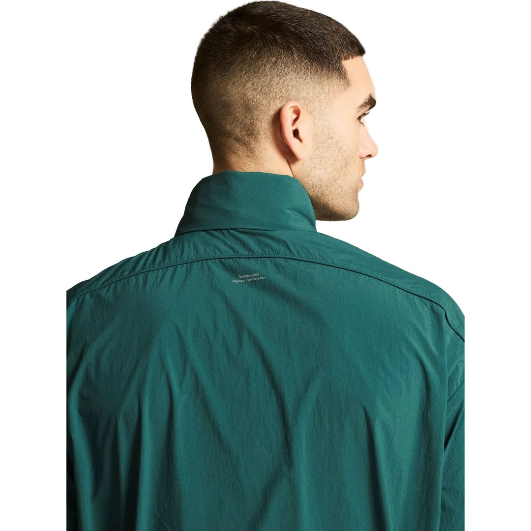 Back view of Craft Hypervent Oversized Wind Jacket Men&