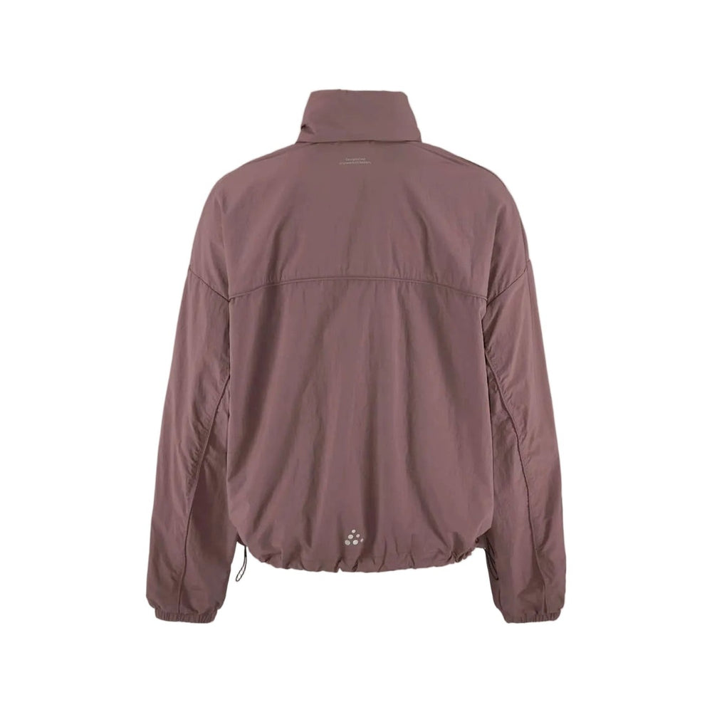 Purple jacket on a beige background
