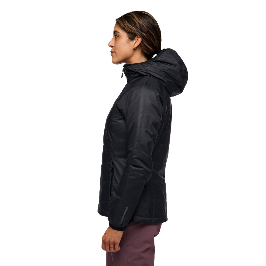 Black Diamond Women’s Solution Hoody with synthetic insulation, stretch-woven exterior, insulated hood, and women’s-specific performance fit. Side view with model.