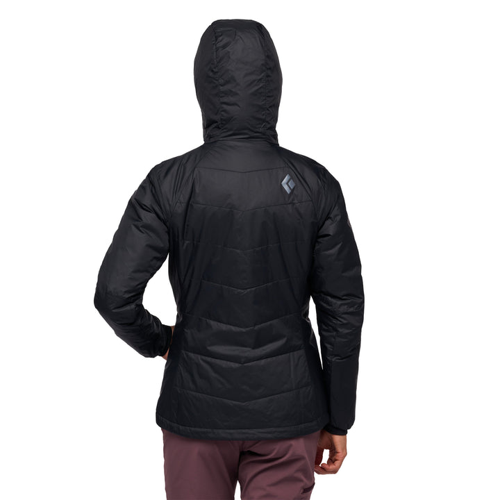 Black Diamond Women’s Solution Hoody with synthetic insulation, stretch-woven exterior, insulated hood, and women’s-specific performance fit. With model.