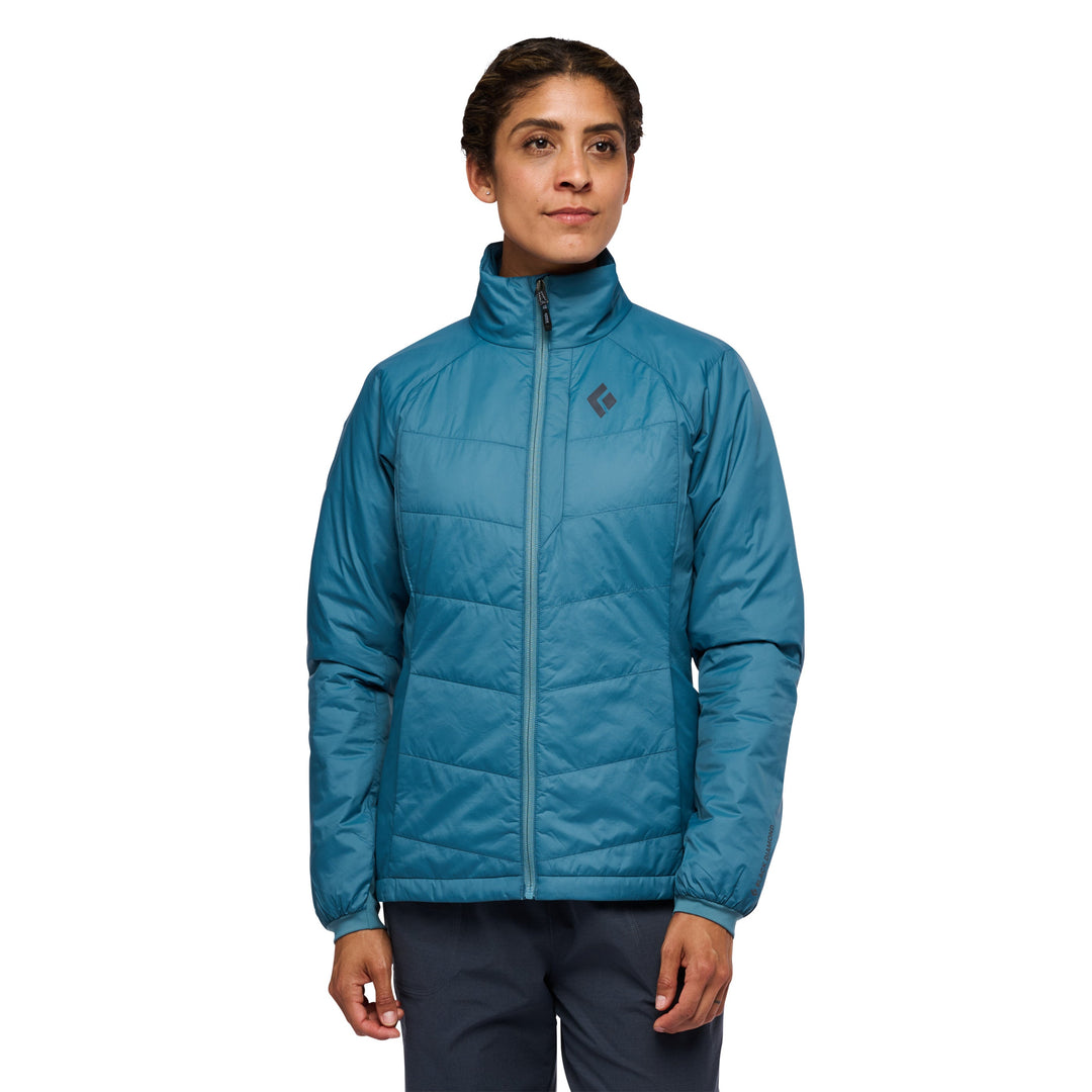 Black Diamond Women’s Solution 2.0 Jacket with synthetic insulation, stretch-woven outer fabric, full zip, and women’s-specific performance fit. Creek blue with model