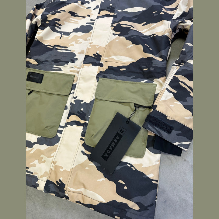 close up of Armada Lunara 2L Insulated Jacket with waterproof shell, mapped insulation, adjustable hood, and powder skirt.