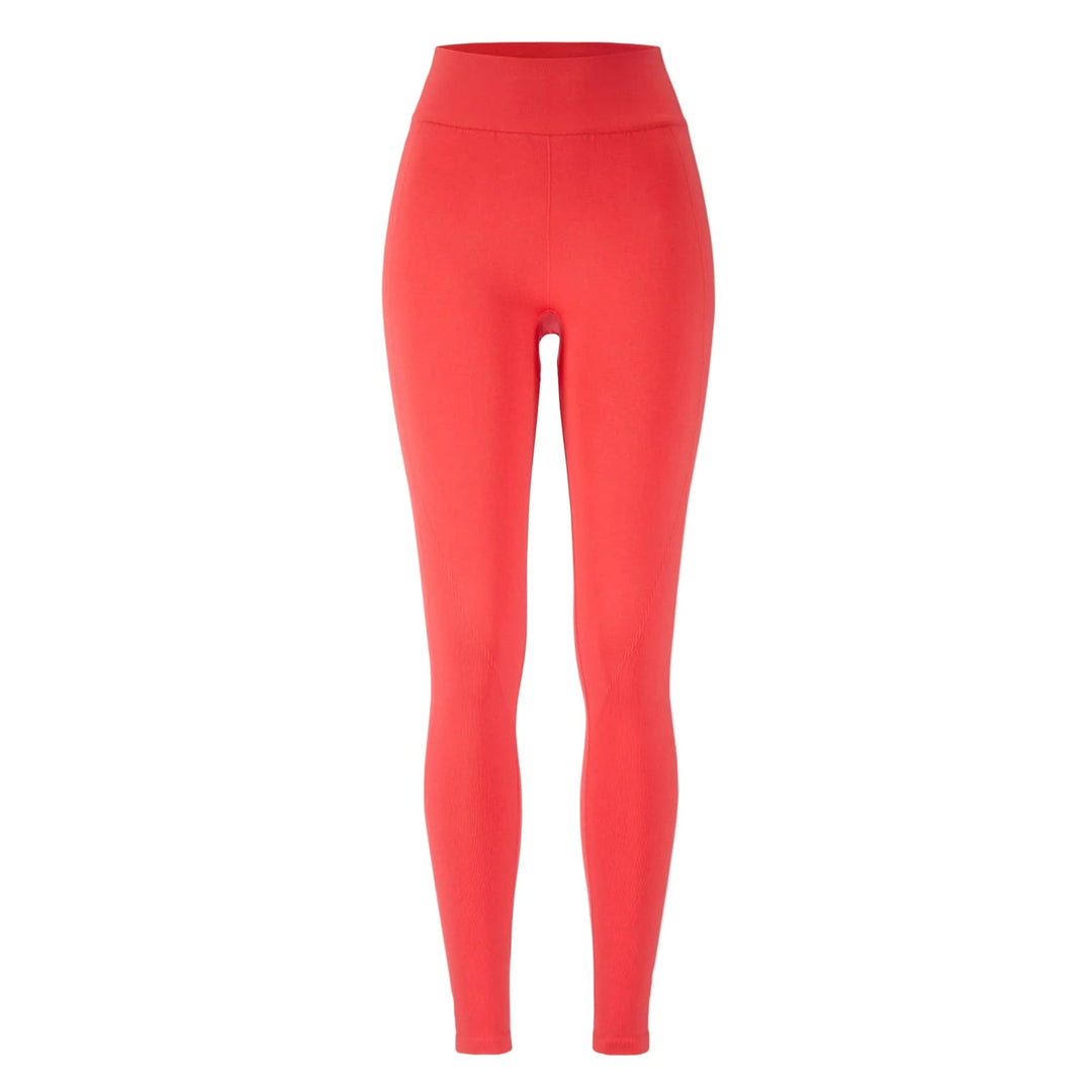 Red leggings on a beige background