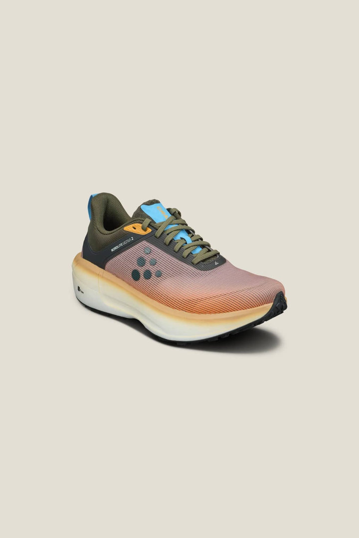 Multicolored running shoe on a beige background