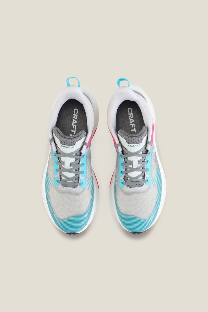 Pair of gray and blue running shoes with &