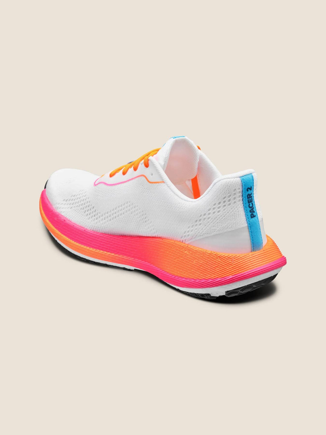 White running shoe with orange and pink accents on a beige background