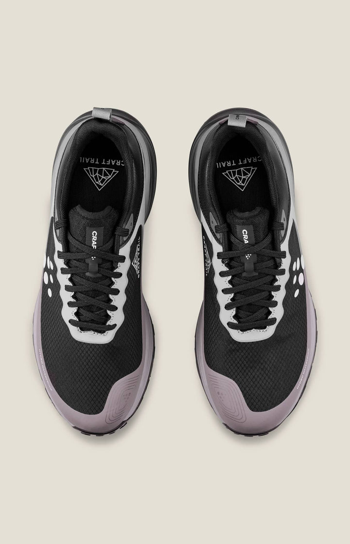 Black and gray sneakers on a beige background