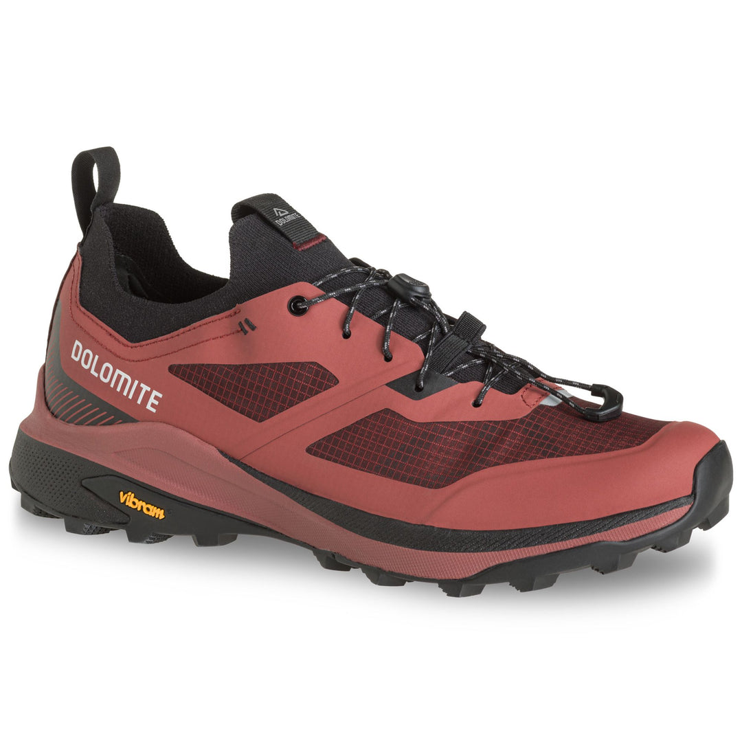 Red and black hiking shoe with visible brand name on a white background
