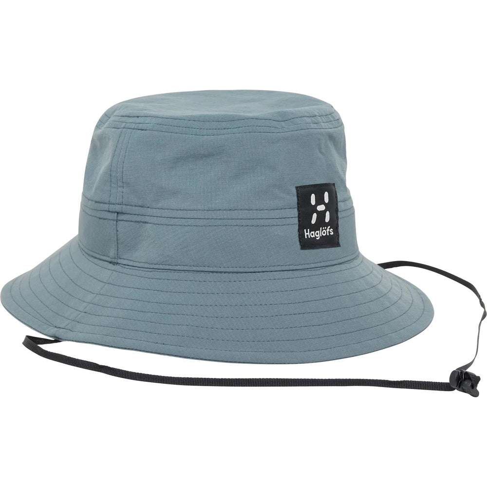 Blue bucket hat with a brand logo on a white background