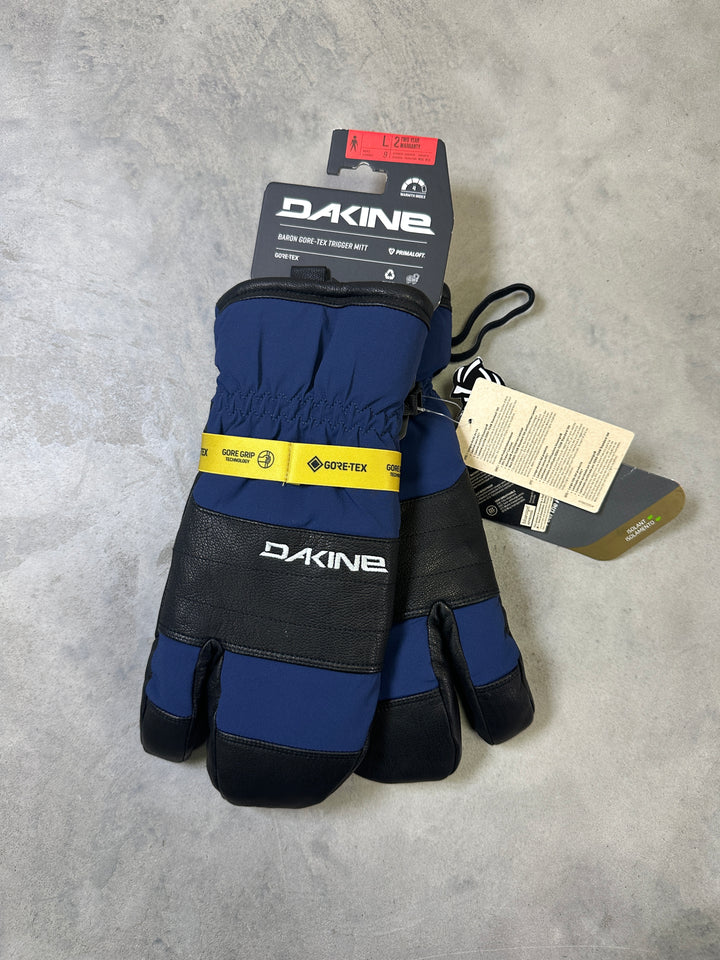 Dakine Baron GORE-TEX Trigger Mitts with waterproof membrane, leather palm, synthetic insulation, and trigger mitten design.