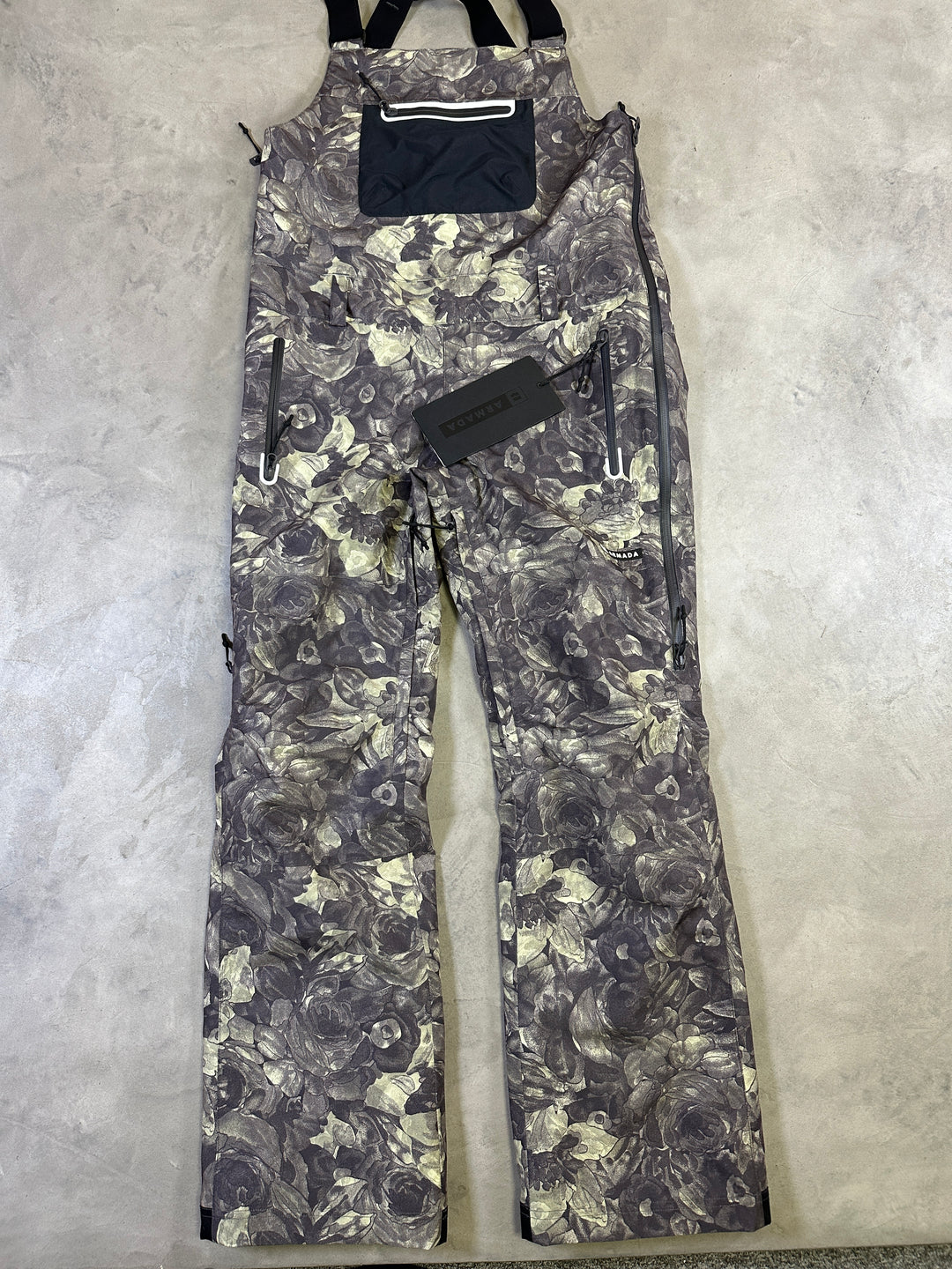 BLACK FLORAL Armada Pascore women’s ski and snowboard bib pants with waterproof breathable fabric and adjustable shoulder straps.
