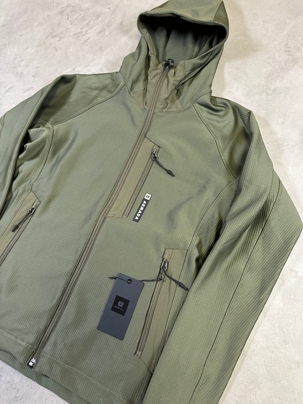 Armada Venyu Grid Full Zip Fleece midlayer with breathable grid fabric and full-length zip.