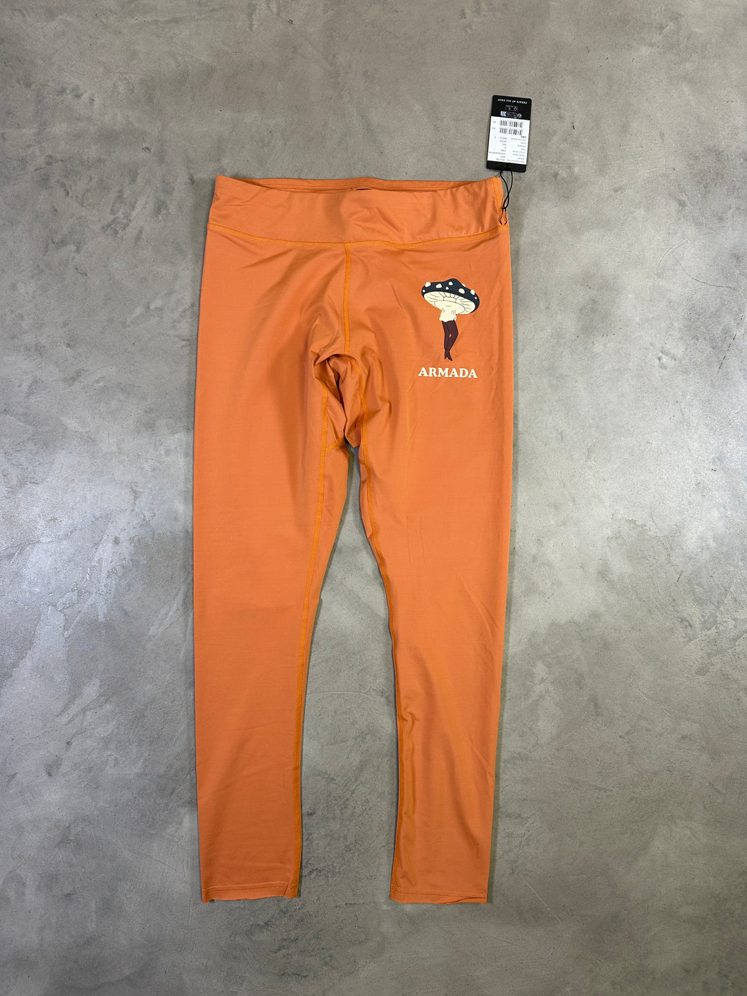 Armada Haven women’s thermal ski base layer leggings with stretch moisture-wicking fabric. sienna