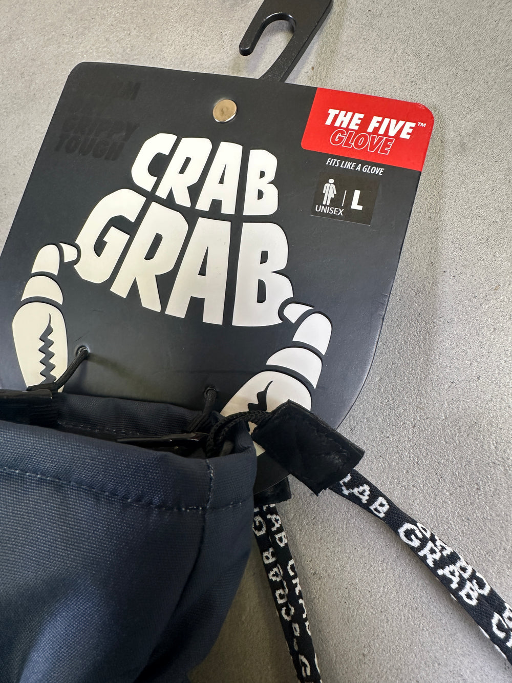 Crab Grab brand label on a gray background