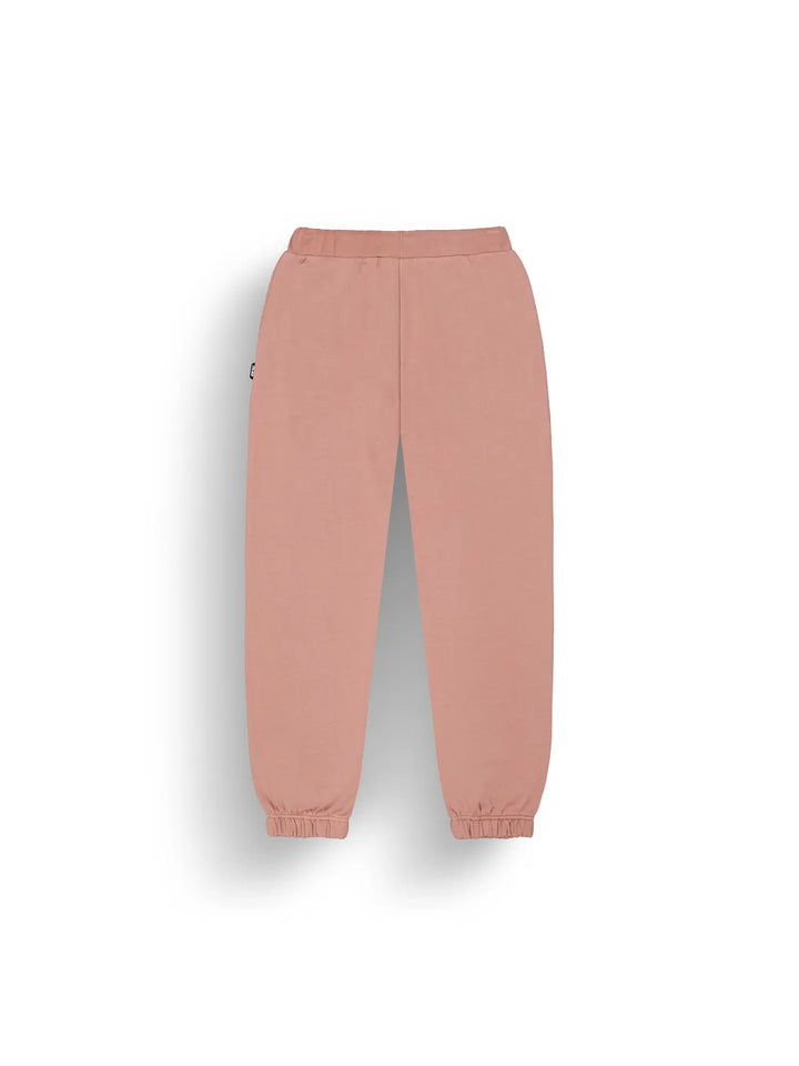 Pink sweatpants on a white background