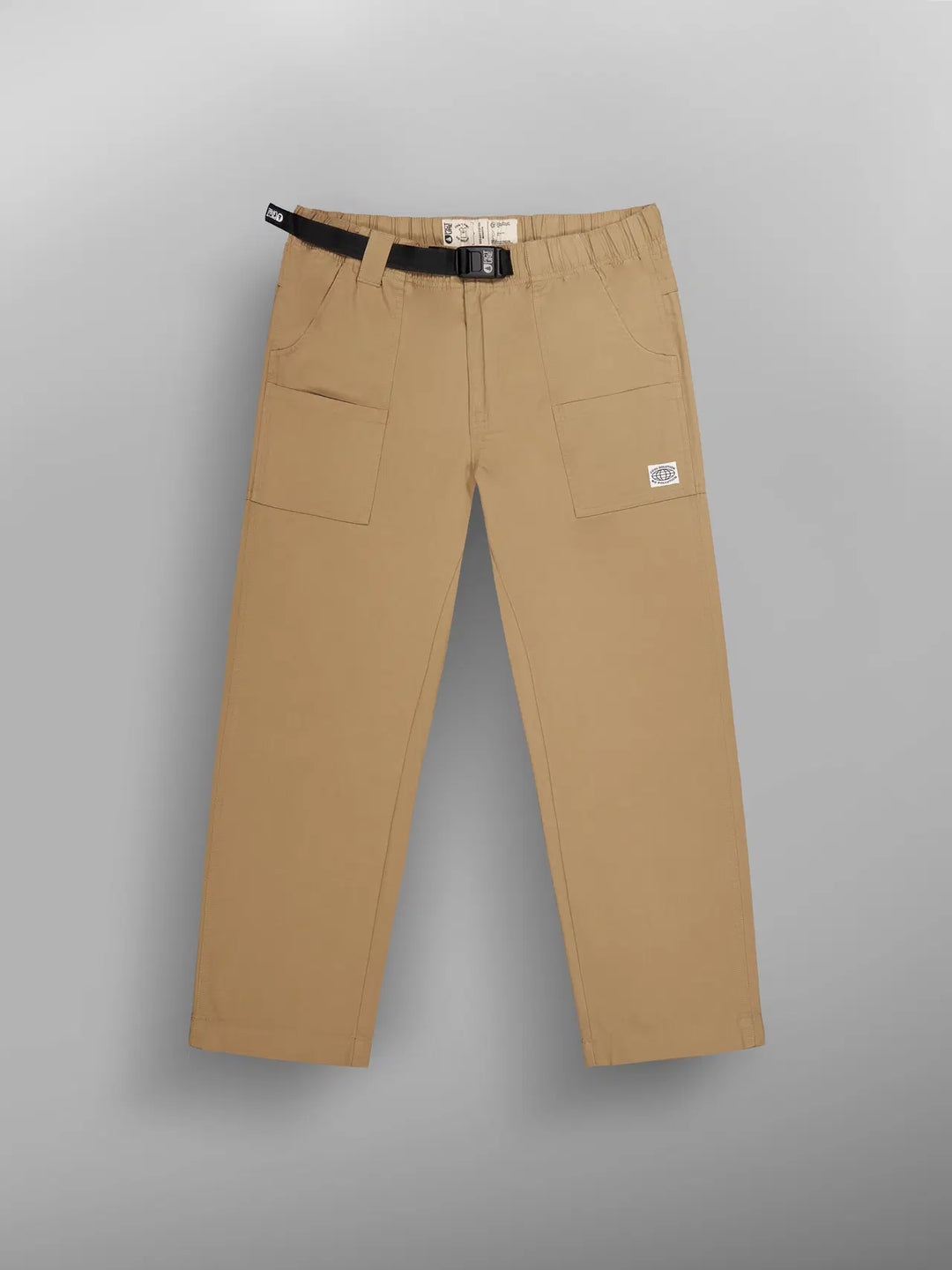 Beige pants with a black belt on a gray background