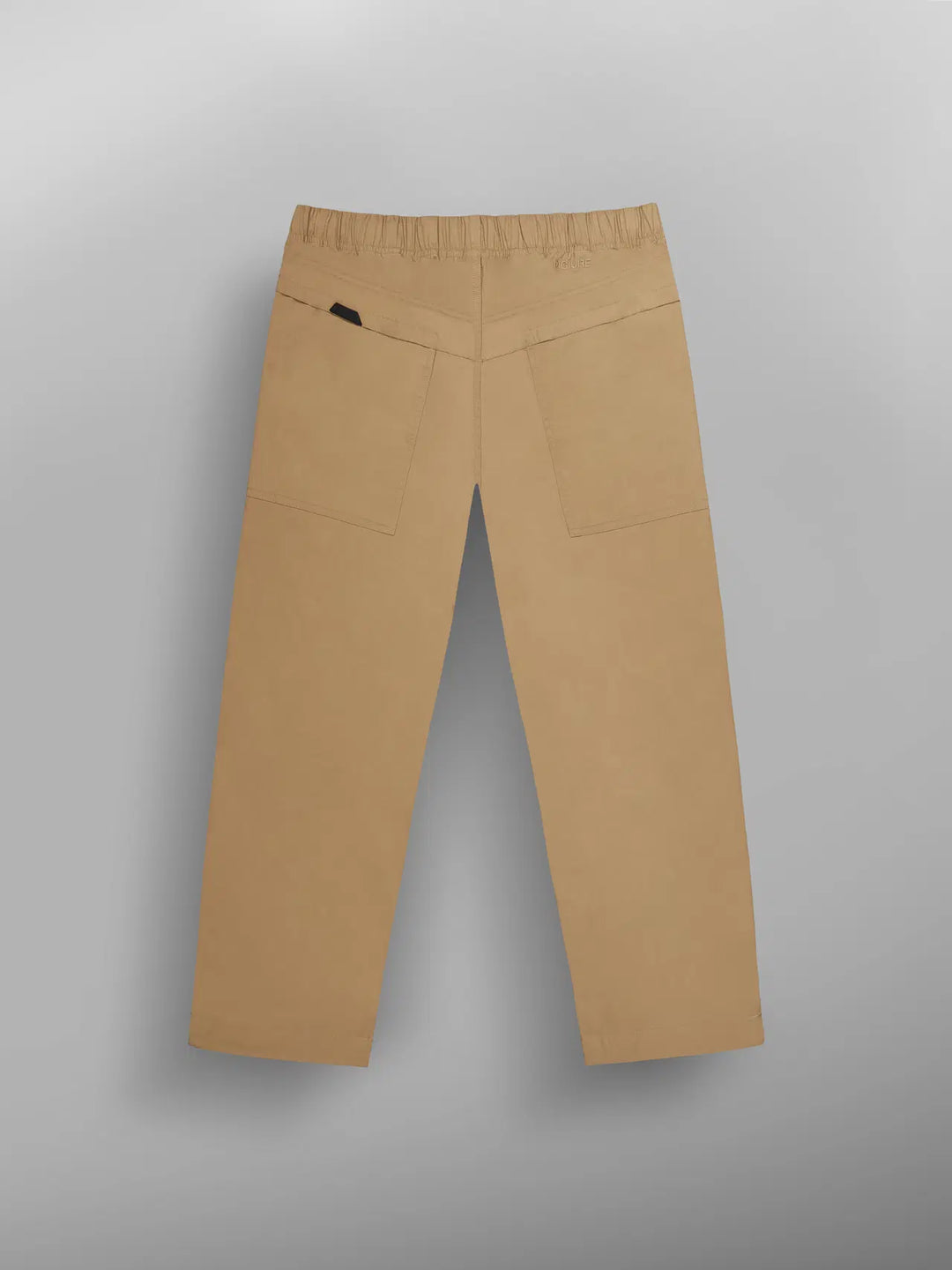 Beige pants on a gray background
