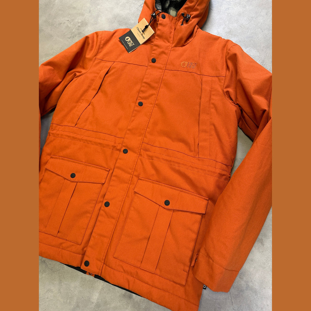 Picture Doaktown Jacket with waterproof recycled shell, lightweight insulation, adjustable hood, and powder skirt.” close up 