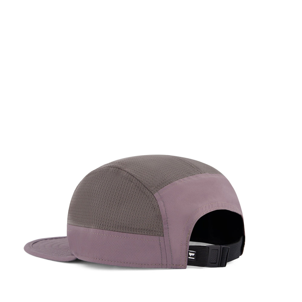 Two-tone cap with gray and purple sections on a white background