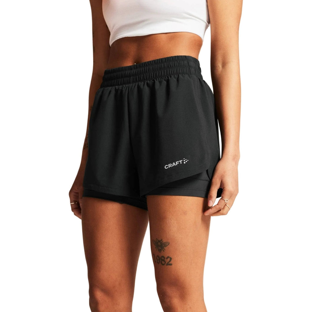 Craft ADV Essence 2 - in - 1 Shorts 2 Women’s Black M - SAMPLE DROP