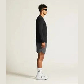 Craft ADV Essence LS Tee 2 Men Black side view athletic long sleeve workout shirt stretch fabric