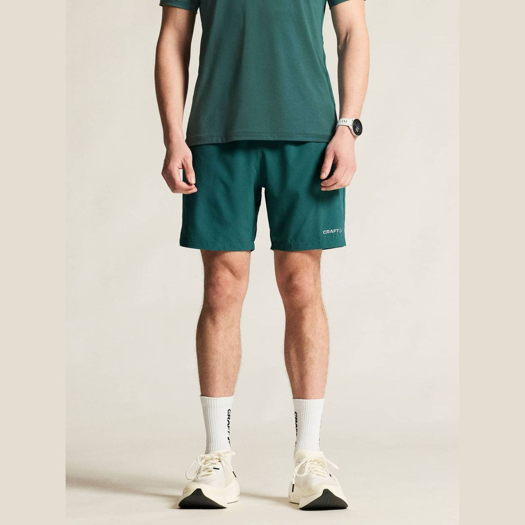 Craft ADV Essence Shorts Men Peridot - SAMPLE DROP