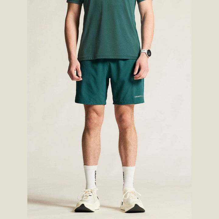 Craft ADV Essence Shorts Men Peridot - SAMPLE DROP