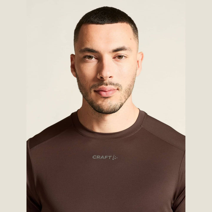 Craft ADV Essence SS Tee 2 Men’s Prune M - SAMPLE DROP