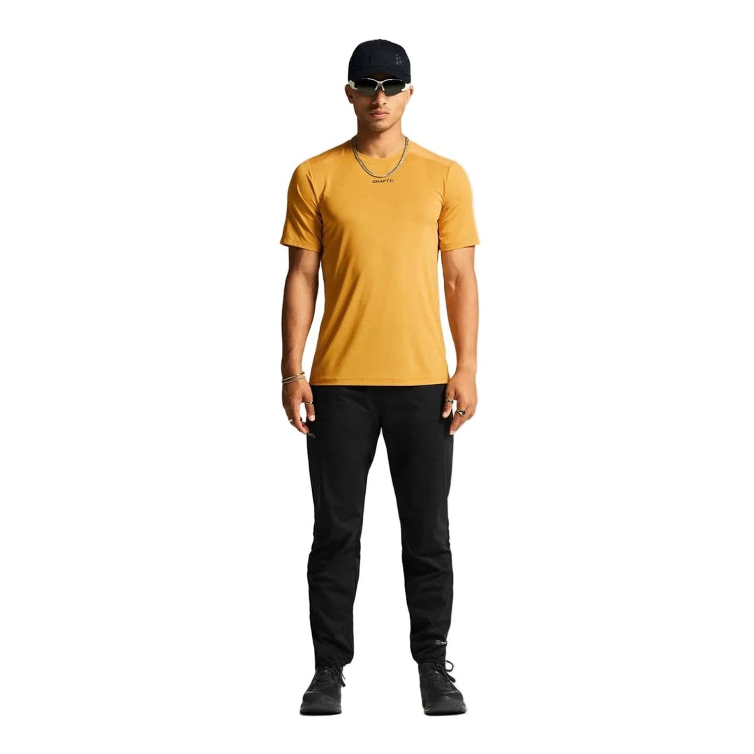 Craft ADV Essence SS Tee 2 Men's - Turmeric - SAMPLE DROP