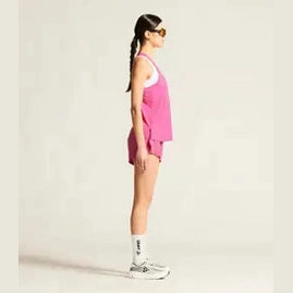Craft Race Day Singlet 2 Women Magenta side view ergonomic fit lightweight running tank top stretch fabric side slits performance wear